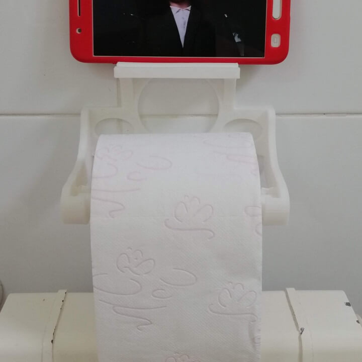 Toilet paper with a phone holder